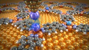 Fonte: phys.org. Átomos de gases nobres interagindo em uma superfície sólida.